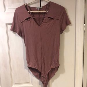 Charlotte Russe mauve bodysuit with cutouts